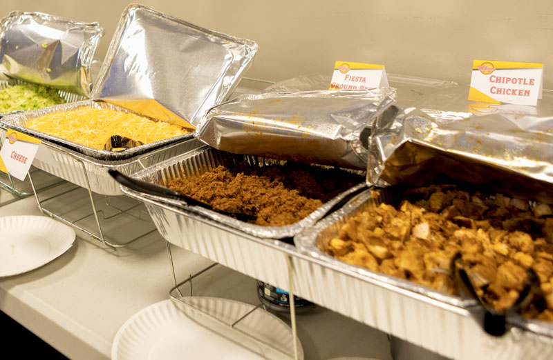 Wilson’s Grill Hilliard catering taco bar with fajita chicken, seasoned taco beef, pico de gallo, corn salsa, shredded lettuce, sour cream, black beans, and fiesta rice.